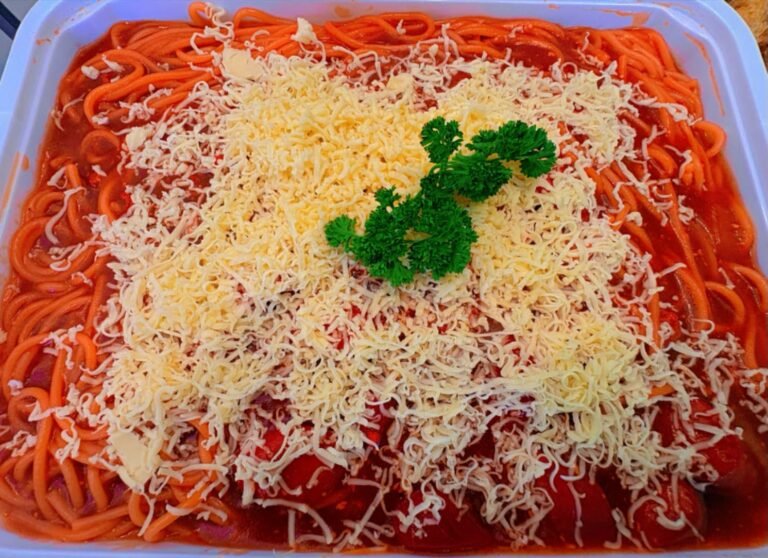 Cafe Esquinita party platter of spaghetti topped with cheese
