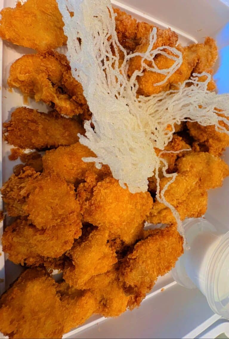 Cafe Esquinita party platter of fried chicken fillet with crispy noodles
